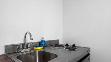 Microwave, stovetop, coffee/tea maker, highchair