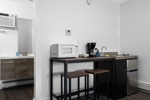 Mini-fridge, microwave, stovetop, coffee/tea maker - Peninsula One Apartments Unit 22 (Traverse City)