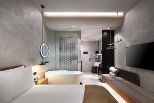 Honeymoon Room | Premium bedding, down comforters, minibar, soundproofing