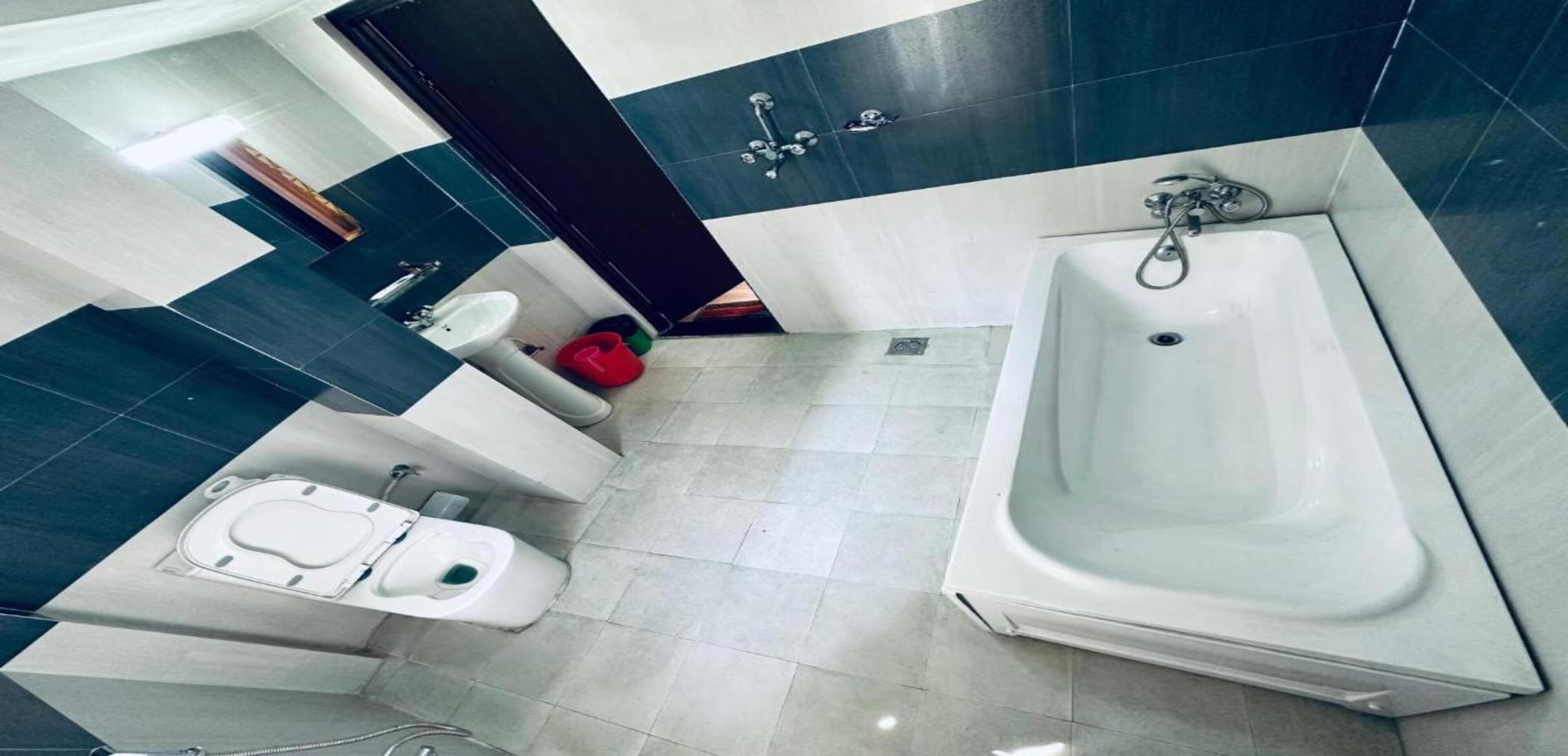 family room | bathroom | shower, rainfall showerhead, towels, soap