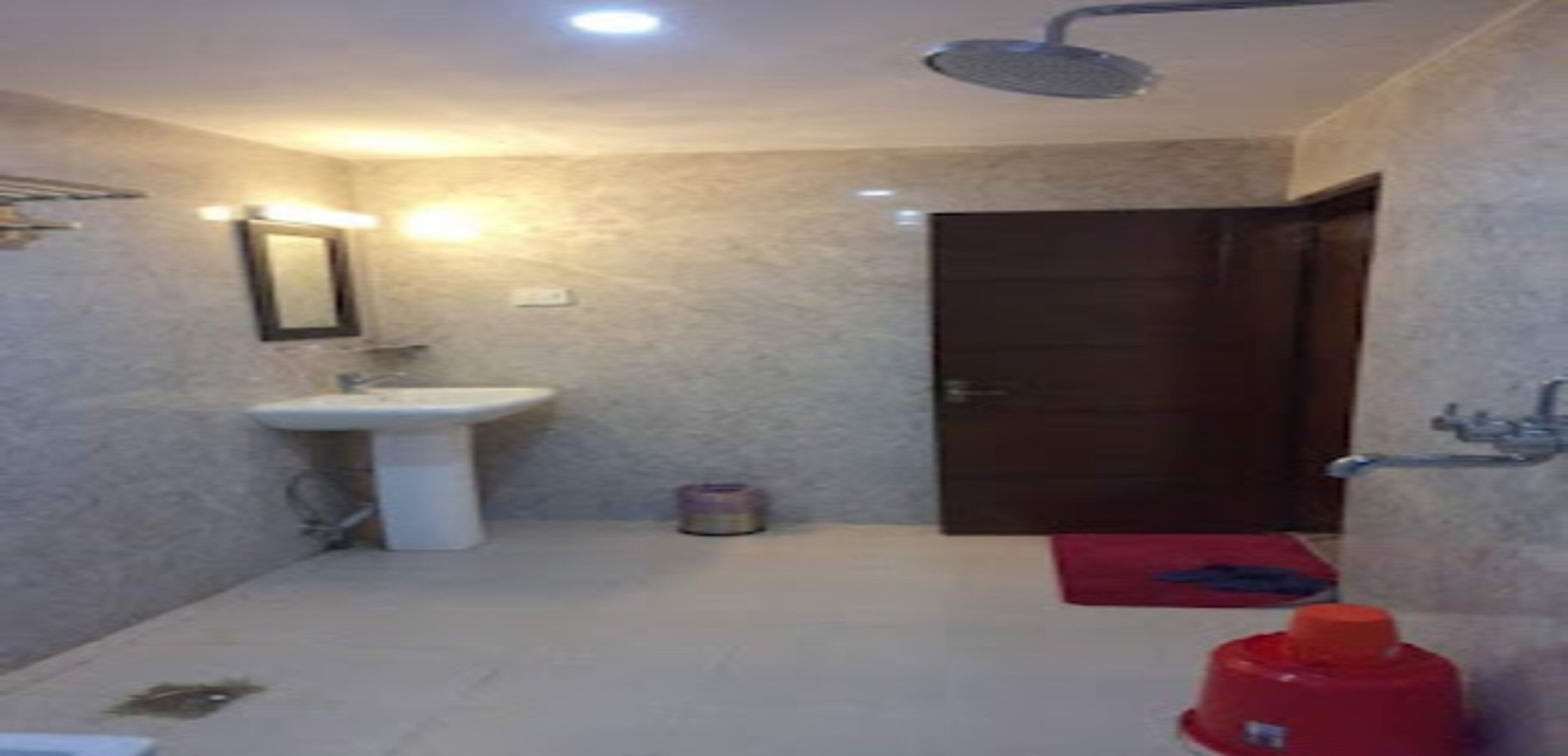 deluxe room | bathroom | shower, rainfall showerhead, towels, soap