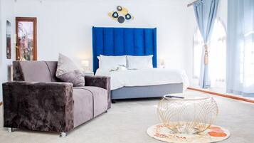 Deluxe-Doppel- oder -Zweibettzimmer | Schreibtisch, laptopgeeigneter Arbeitsplatz, kostenloses WLAN