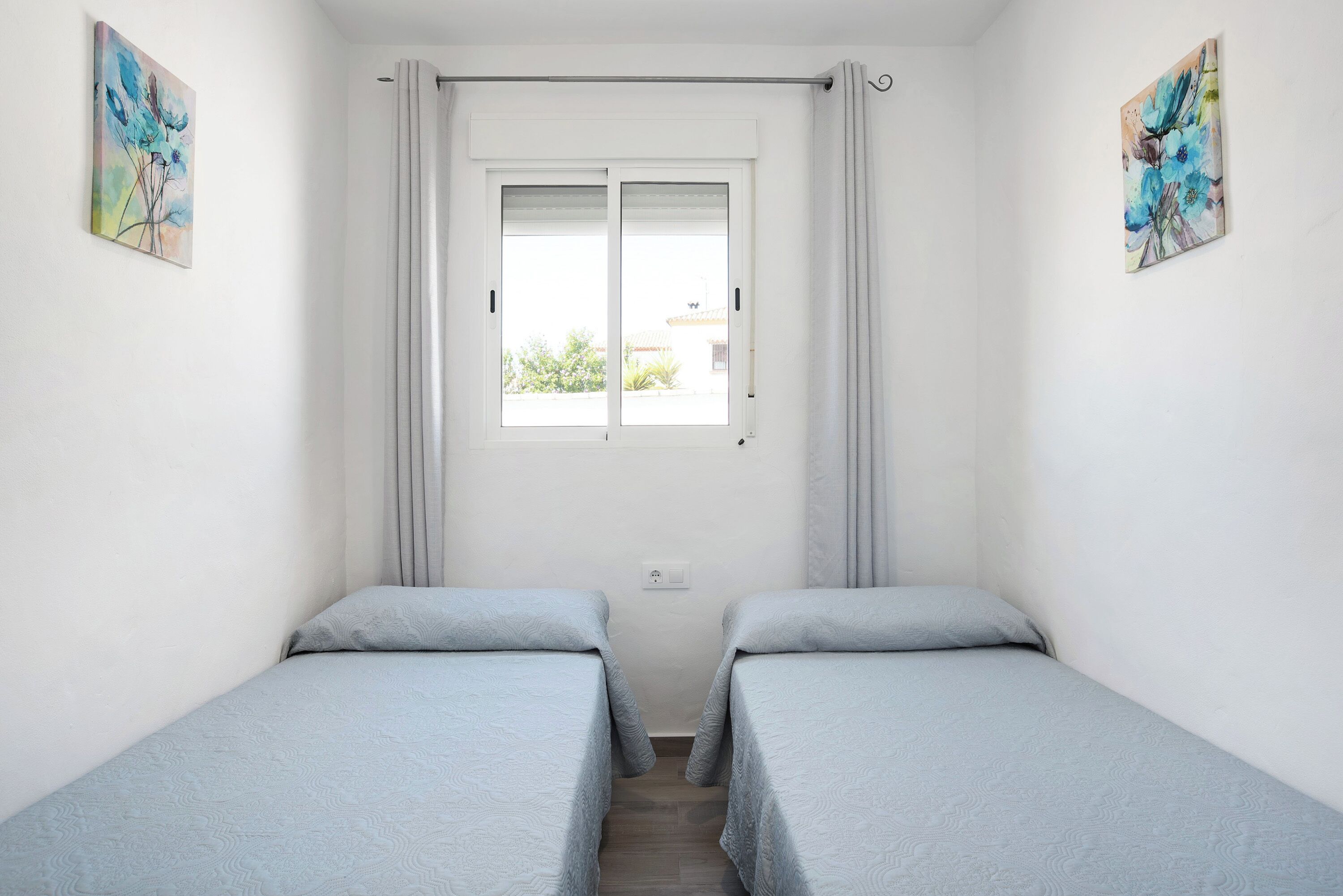 2 dormitorios, tabla de planchar con plancha, wifi gratis y ropa de cama