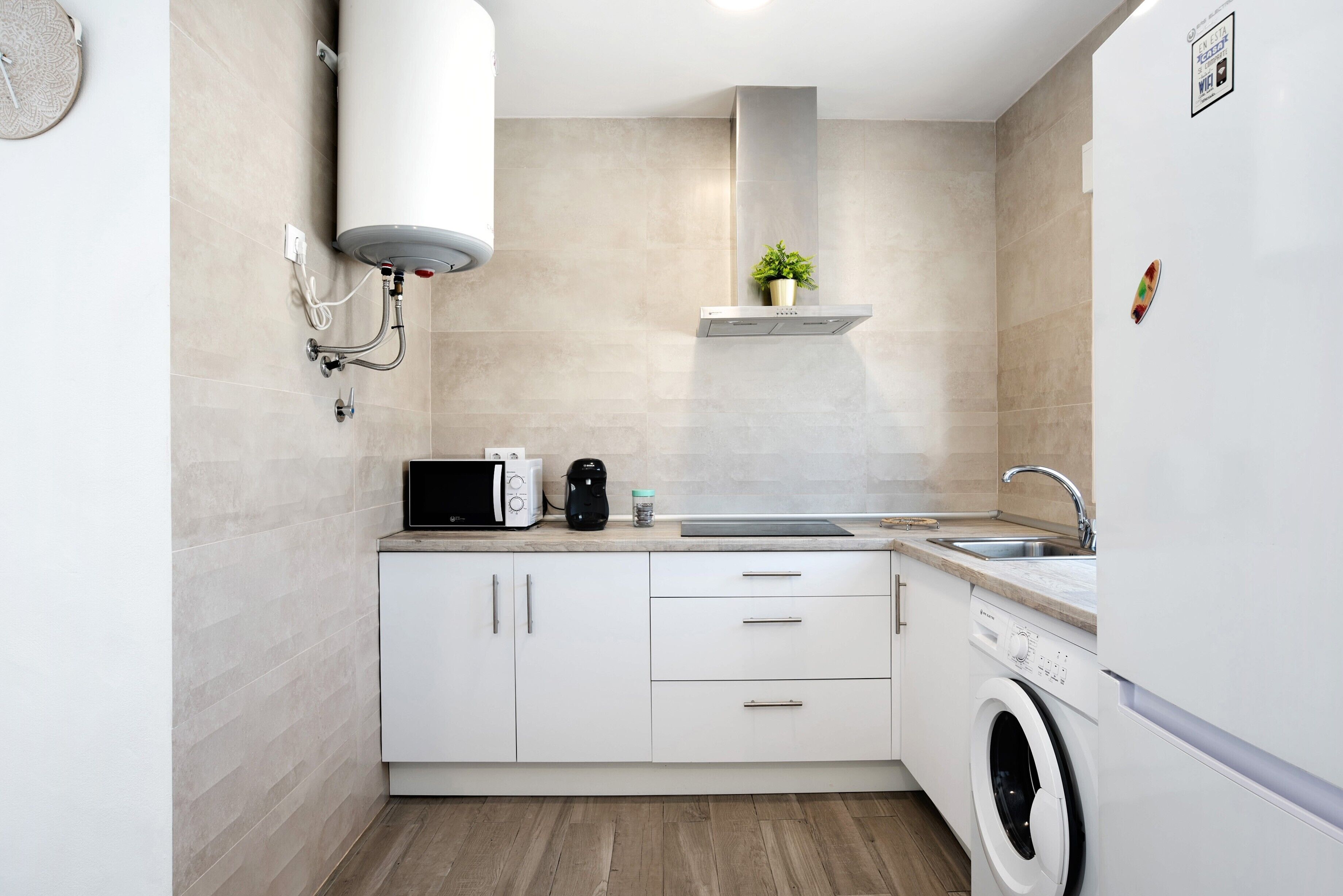 Fridge, microwave, stovetop, coffee/tea maker