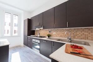Fridge, microwave, oven, dishwasher - The Best Rent - Four Bedroom Apartment near Roma Termini (Roma)