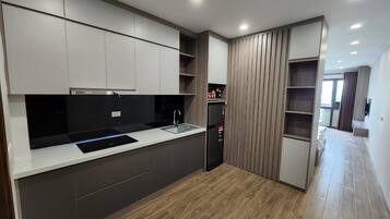 Family Bungalow | Private kitchen | Fridge, kitchen islands