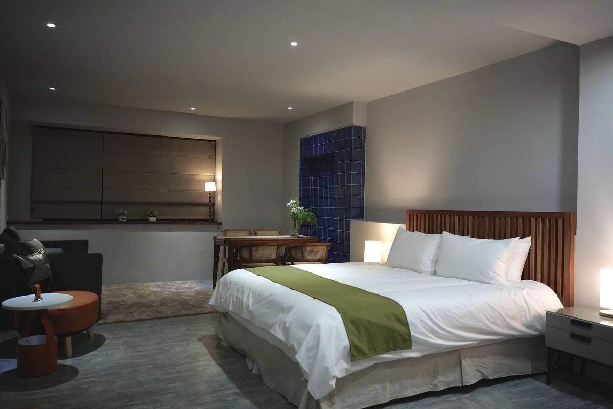 Premium bedding, down duvets, laptop workspace, blackout curtains