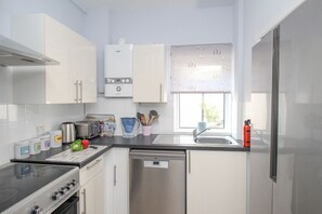 Fridge, dishwasher, electric kettle, toaster