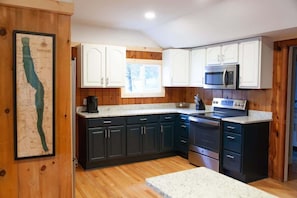 Fridge, microwave, oven, stovetop - Lakefront Cottage w/ Dock & Fire Pit - Pet-Friendly (Geneva)