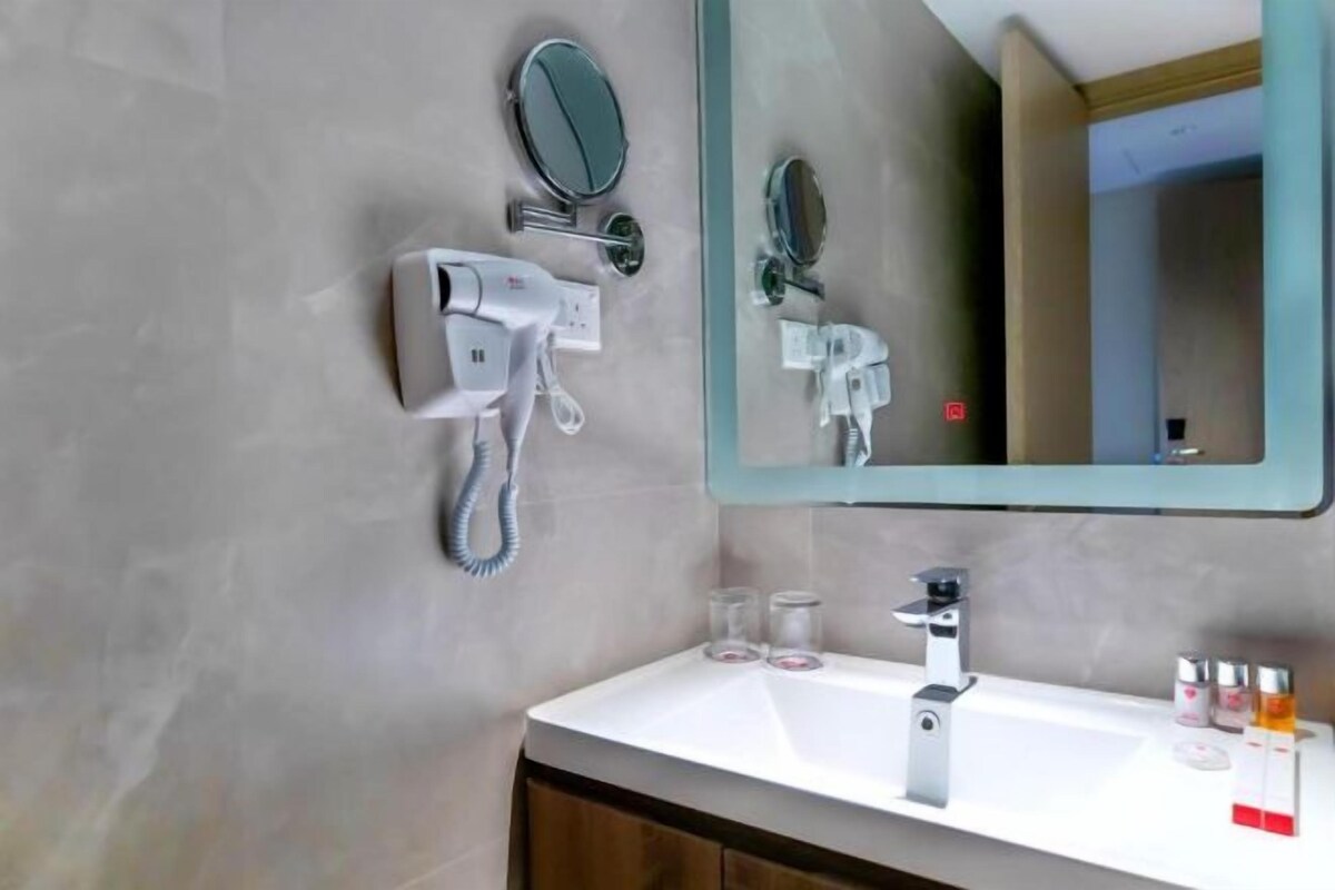 Bathroom | Shower, free toiletries, hair dryer, slippers
