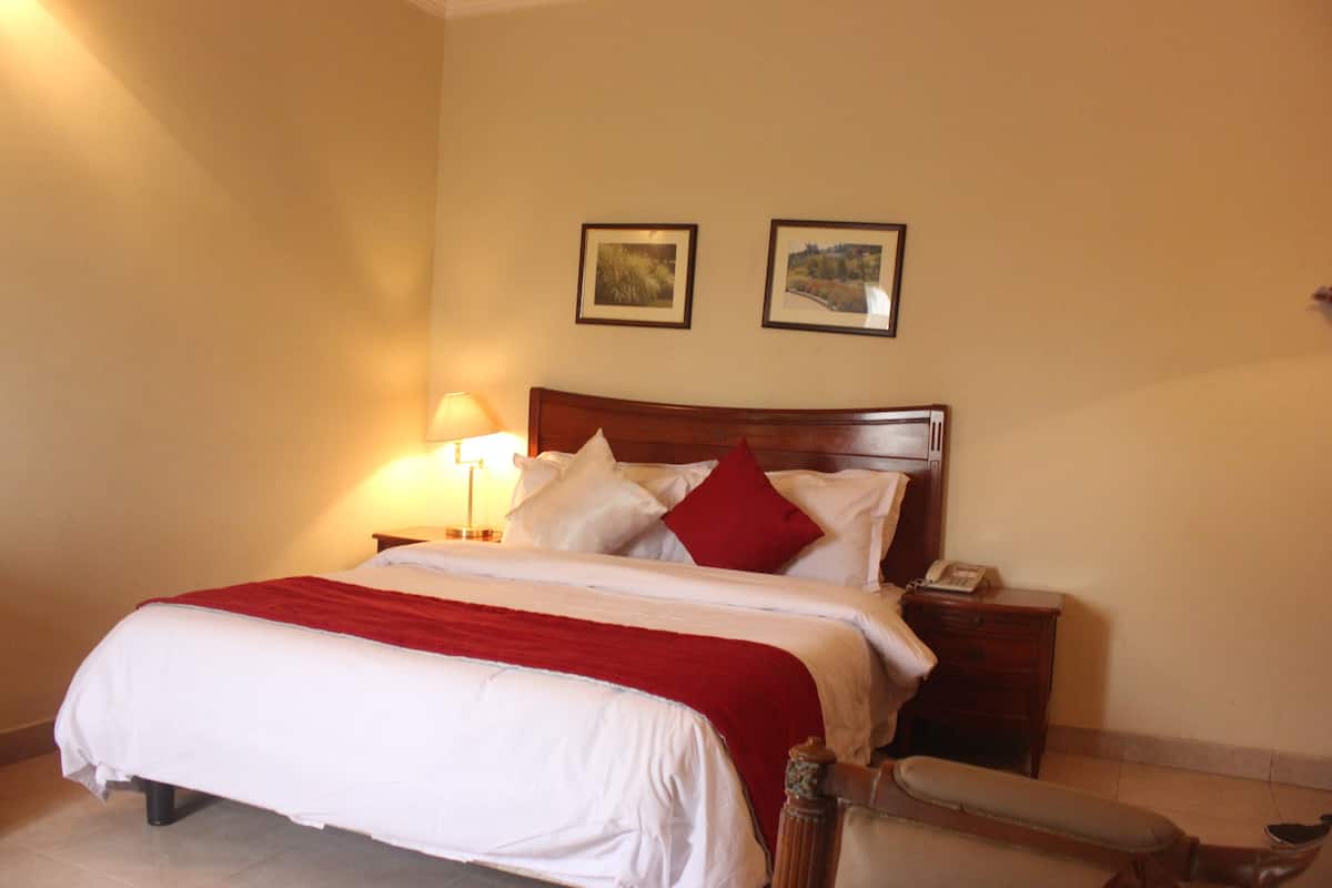 Premium bedding, down duvets, desk, laptop workspace