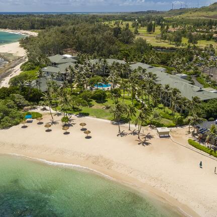 On the beach, sun loungers, beach towels
