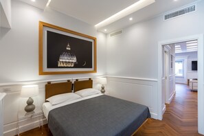 1 chambre, coffres-forts dans les chambres, fer et planche à repasser
