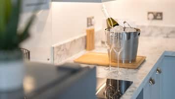 Luxury Apartment | Private kitchen | Full-sized fridge, oven, stovetop, electric kettle