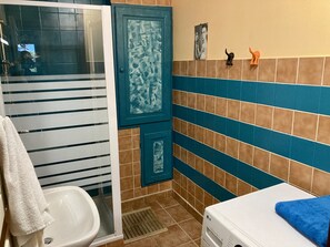 Shower, hair dryer, towels, soap