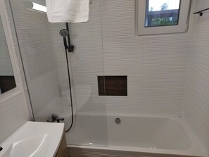 Hair dryer, bidet, towels, soap