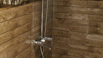 Shower, slippers, towels, soap