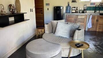 Premium Villa | Living area | 32-inch Smart TV with cable channels, TV
