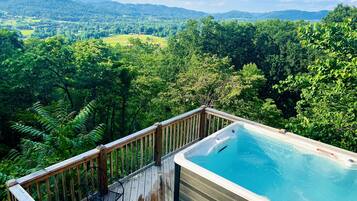 Cabana, vários quartos | Banheira de hidromassagem particular