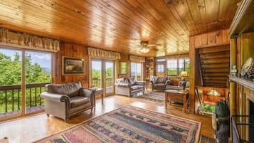 Cabana, vários quartos | Área de estar