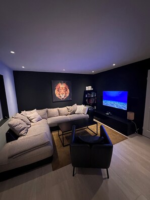 Appartement | Coin séjour | Télévision à écran plat, console de jeux vidéo