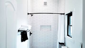 Shower, hair dryer, towels, soap