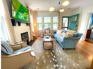 Smart TV, fireplace, books