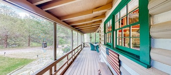 Bird-watcher's creekside cabin with screened porch, fireplace, yard, & firepit
