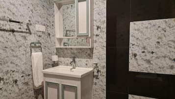 Hair dryer, towels, soap, shampoo