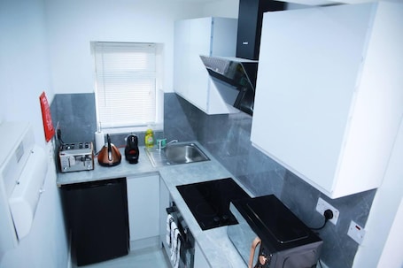 Refrigerador, microondas, horno, placa de cocina