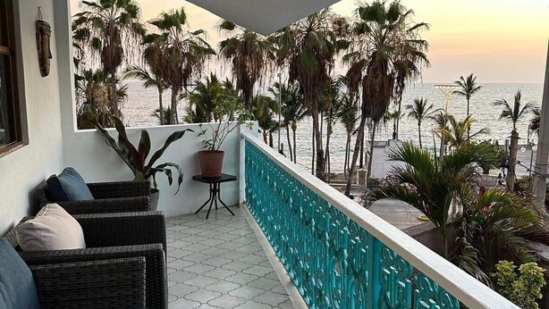 A balcony with wicker furniture and a view of the sea. - 4,000 sq ft 6 bed ocean Villa w/housekeeping included!! (Mazatlán)