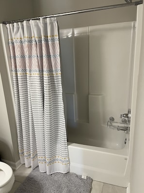 Hair dryer, towels, soap, toilet paper
