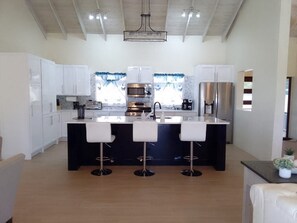 Fridge, microwave, oven, stovetop - Villa Aurora Antigua - 5 Beds 4 Baths Unit (Osbourn)