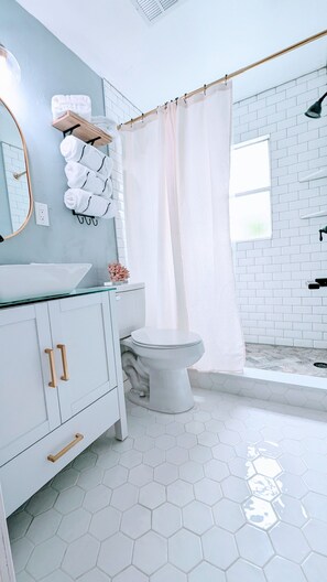 Shower, towels, toilet paper