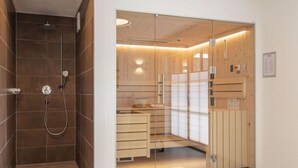 A modern bathroom with a glass shower enclosure, wooden cabinets, and a visible towel rack. - Superior # 2B mit Sauna by Interhome (Uttendorf)