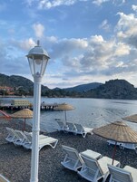 Private beach, beach umbrellas, beach bar