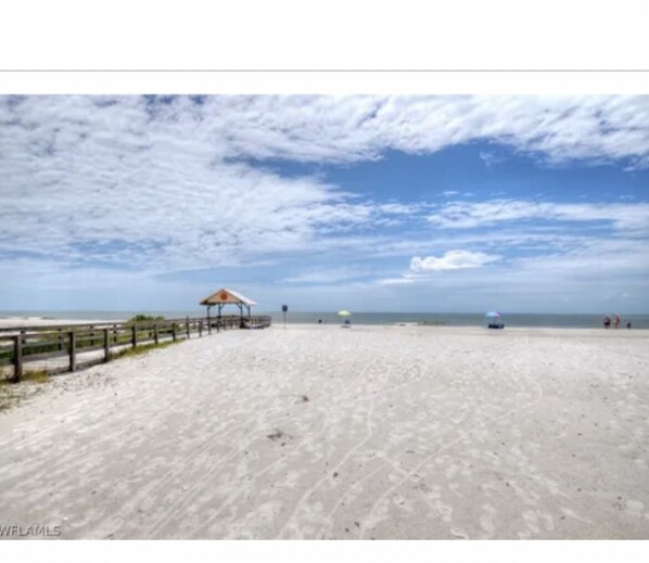 Walk along the beach to a secluded beach hut.