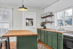 Fridge, coffee/tea maker, cookware/dishes/utensils