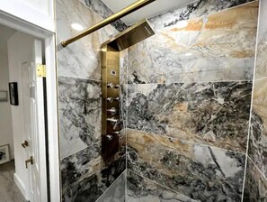 Shower, hair dryer, towels, soap