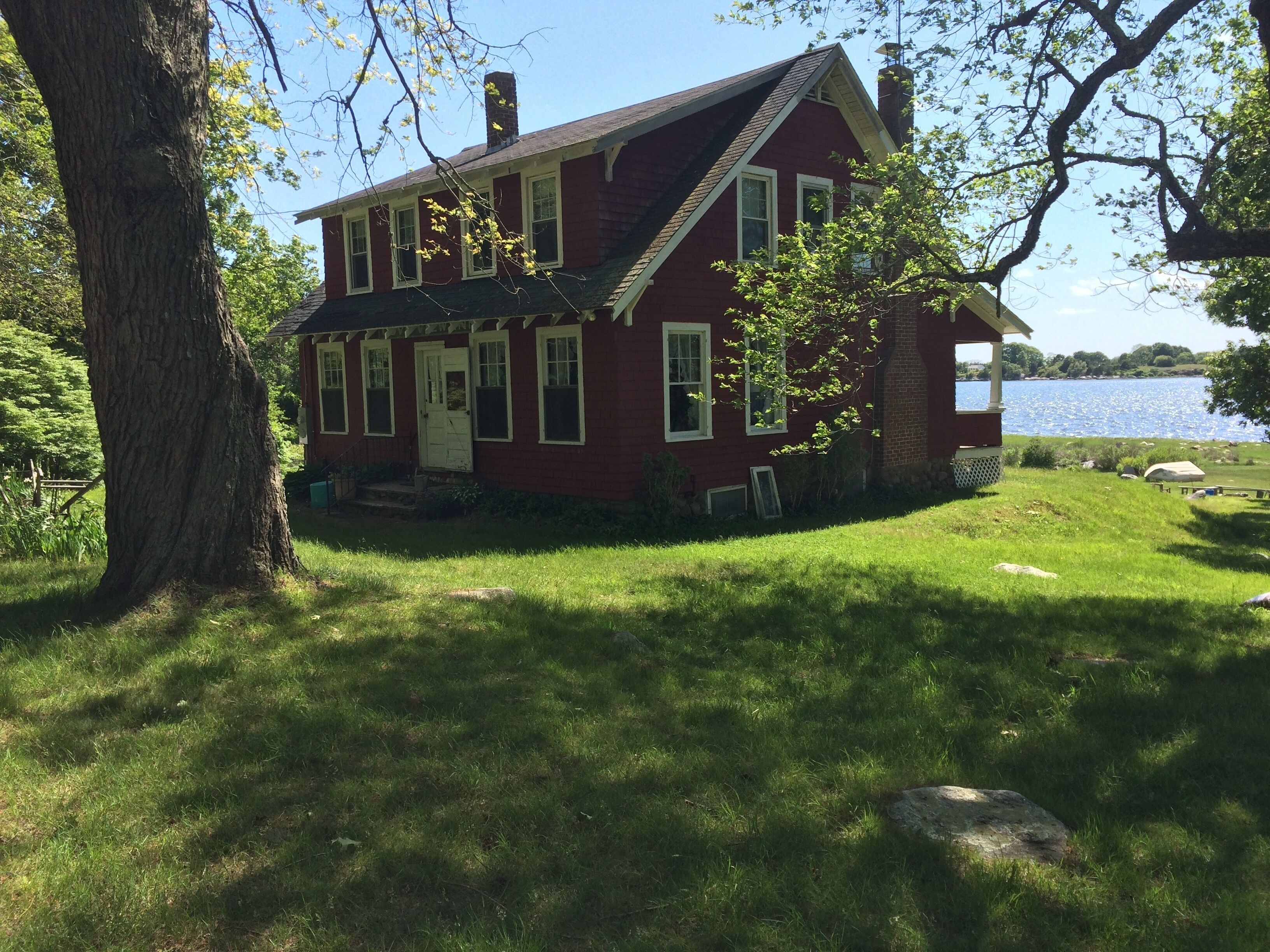 Charming waterfront 1920s Craftsman-style home on 4+ private acres