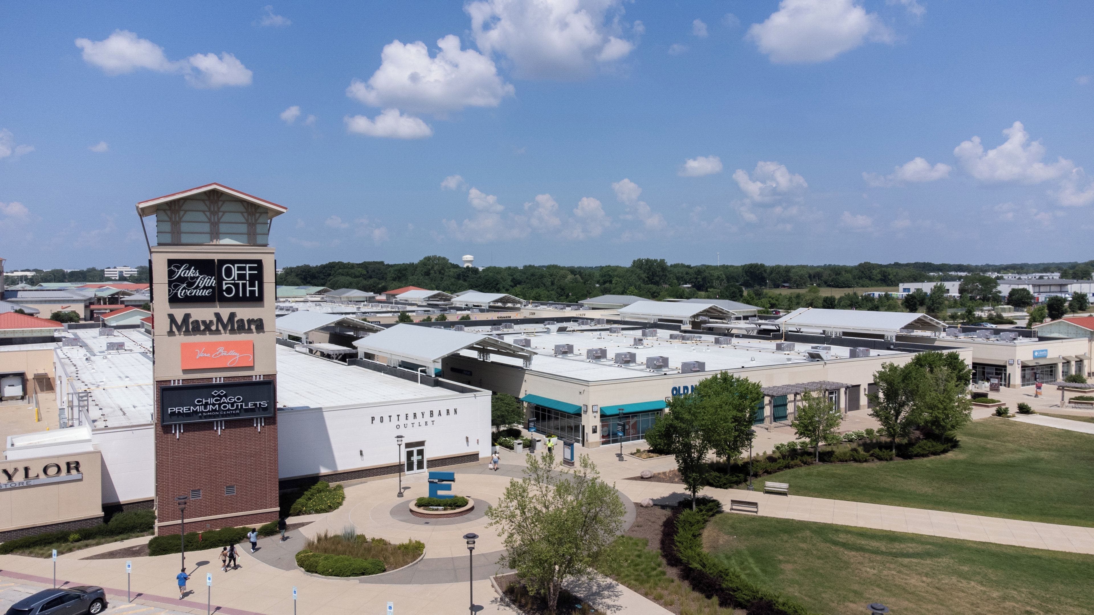 A commercial area with multiple outlet stores, including a Pottery Barn outlet.