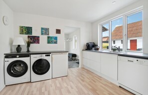 Fridge, stovetop, dishwasher, coffee/tea maker