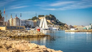 A marina with boats, a sign reading "MARINA DE DENIA", and buildings in the background. - Lovely home in El Rafol D'Almunia (El Rafol D'Almunia)