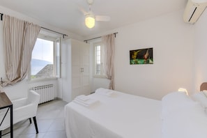 2 chambres, coffre-fort, accès au Wi-Fi (inclus), literie fournie