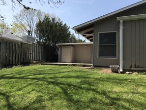 Enjoy an and secure environment with a well-maintained lawn and a two-car garage.