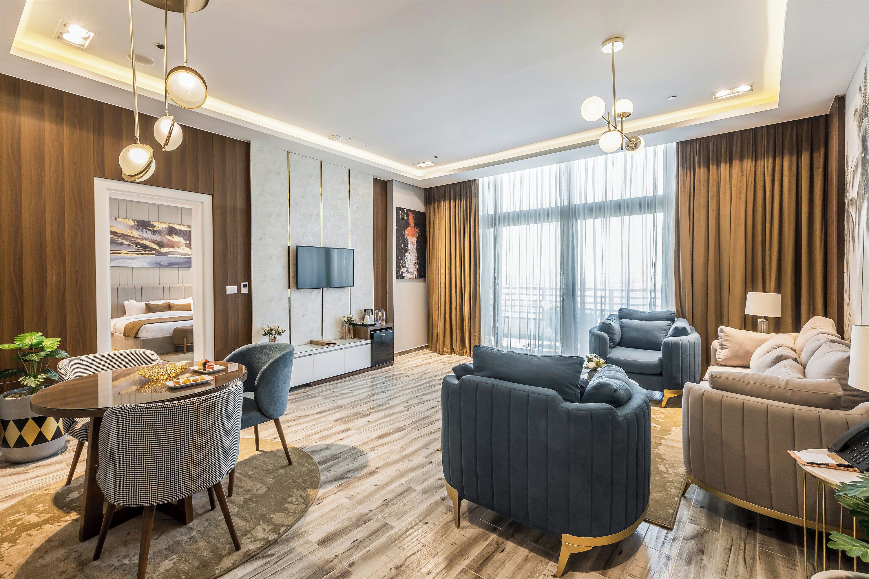 Deluxe suite sea view | Living area | 32-inch LCD TV with satellite channels, fireplace, heated floors