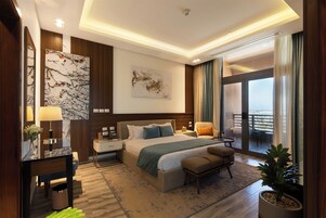 Premium suite Sea and Pool view | Down comforters, minibar, in-room safe, individually decorated