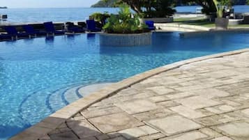 Outdoor pool, pool umbrellas, pool loungers