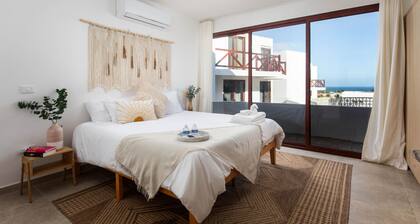 Ocean Views from every room! Modern Condo near the beach. No cleaning Fees!