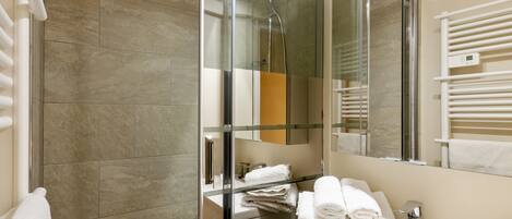 Shower, free toiletries, hair dryer, towels